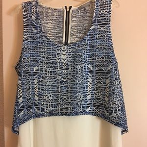 Sleeveless two-material blouse